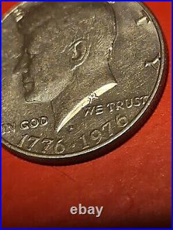 1776-1976 D Kennedy half dollar filled Mint Mark