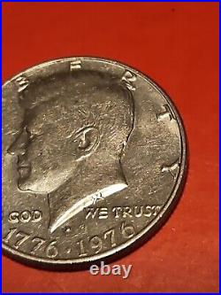 1776-1976 D Kennedy half dollar filled Mint Mark