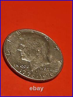 1776-1976 D Kennedy half dollar filled Mint Mark