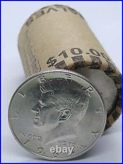 1964 Kennedy! +ONE UNOPENED HALF DOLLAR BANK ROLL MIGHT HAVE 90% SILVER COINS