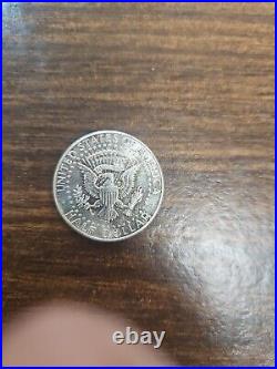 1964- Kennedy, half dollar coin