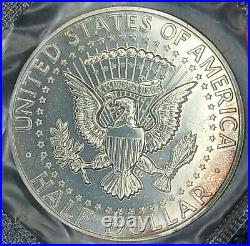 1964-P Kennedy Half Dollar Proof-Accented Hair-Rainbow Toner-In Mint Cello