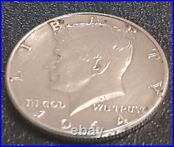 1964 kennedy Silver Dollar Coin