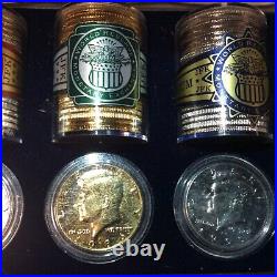 3-Plated Rolls of Kennedy Half Dollars from The World Reserve Monetary Exchange
